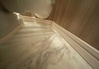 おおたかの森　マンション　トイレ床改修工事　新規CFシート　便器裏　カット完了